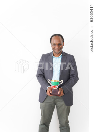 Black business man getting a trophy Black business man getting a trophy 63065414