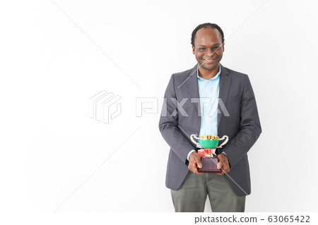 Black business man getting a trophy Black business man getting a trophy 63065422