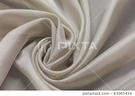 Shiny white cloth background white curly Shiny white cloth background white curly 63065434