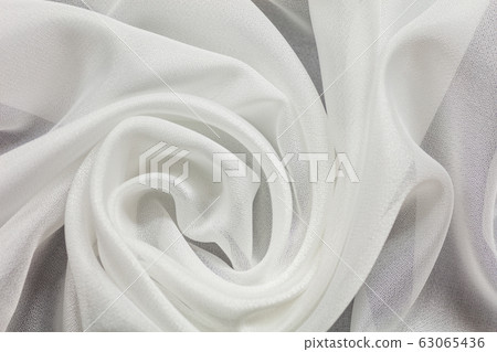 Shiny white cloth background white curly Shiny white cloth background white curly 63065436