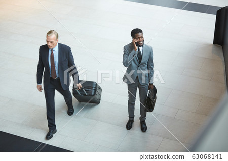 Businessmen In Airport 63068141