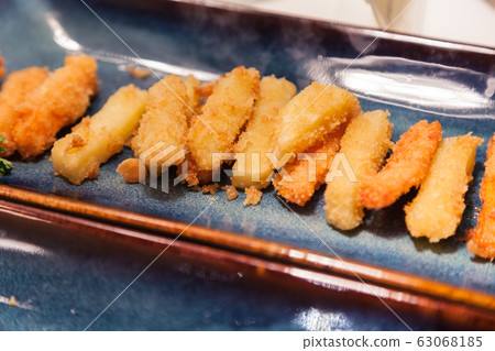 Japanese Food: Vegetable Tempura, Crispy Fried or Baked Variety of Vegetables with Bread Crumbs Japanese Food: Vegetable Tempura, Crispy Fried or Baked Variety of Vegetables with Bread Crumbs 63068185