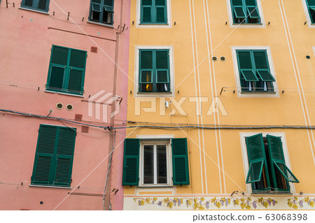 Colorful building walls and windows in Vernazza village in Cinque Terre, Italy Colorful building walls and windows in Vernazza village in Cinque Terre, Italy 63068398