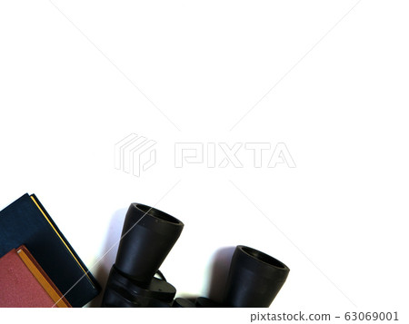 Close-up binoculars on a white background.  63069001