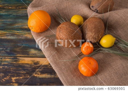Coconuts and citric fruits. Coconuts and citric fruits. 63069301
