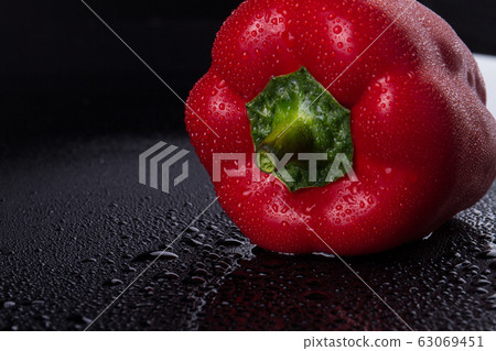 Pepper lies on its side close up. Pepper lies on its side close up. 63069451