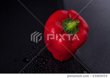 Red bell pepper top view. Red bell pepper top view. 63069454