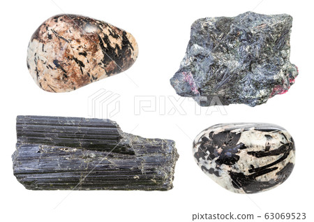 set of various Aegirine rocks isolated on white 63069523