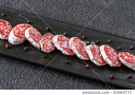 Fuet on the serving plate Fuet on the serving plate 63069771