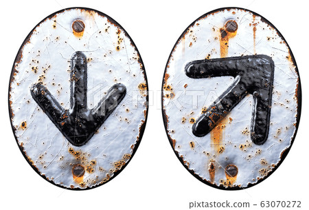 Set of symbols arrow to down and up arrow made of forged metal on the background fragment of a metal surface with cracked rust. 63070272
