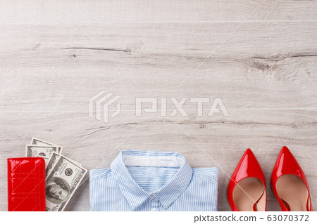 Office woman's flatlay on wooden table. Office woman's flatlay on wooden table. 63070372