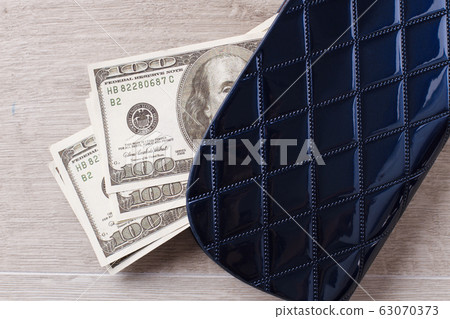 Wallet with american dollars close up. Wallet with american dollars close up. 63070373