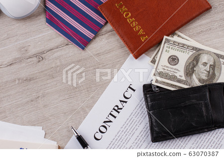 Contract, tie and passport. 63070387