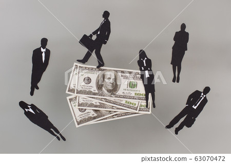 Paper figures of business team. 63070472