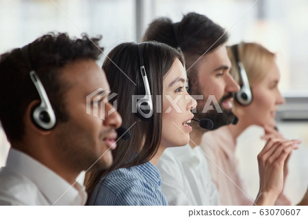 Asian young service support operator, side view. 63070607