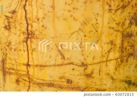 Abstract corroded rusty metal background, texture, yellow brown Abstract corroded rusty metal background, texture, yellow brown 63072813