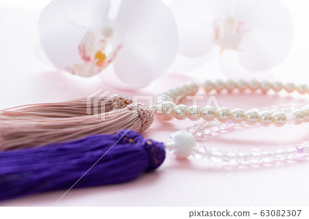 Rosary and Phalaenopsis 63082307