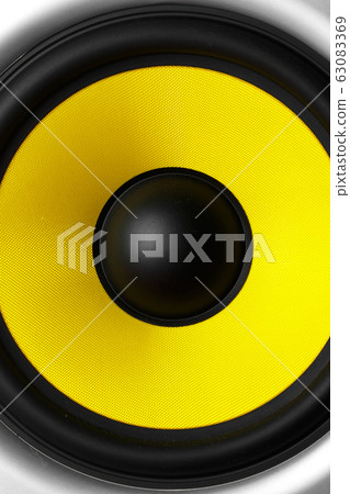 Yellow speaker loudspeaker close-up part of a Yellow speaker loudspeaker close-up part of a 63083369