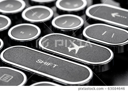Travel icon on retro style computer keyboard for 63084646