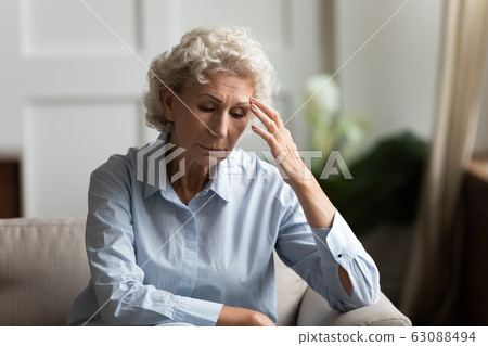 Anxious senior woman feel lonely sad at home 63088494