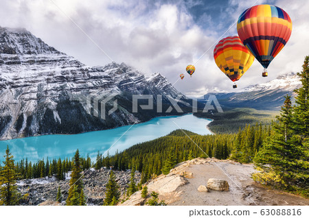 Hot air balloons flying on Peyto lake resemble of Hot air balloons flying on Peyto lake resemble of 63088816