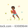 African American Boy Running with a Ball for 63089644