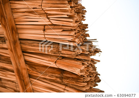 Reed beach umbrella roof close-up Reed beach umbrella roof close-up 63094077