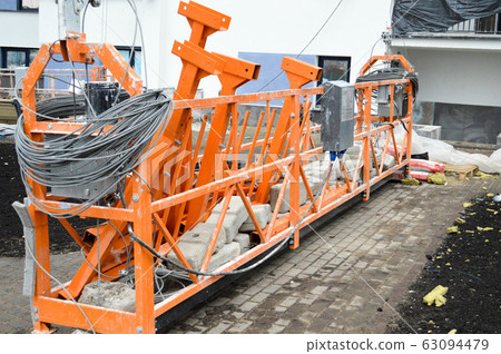 Large iron metal building facade elevator  63094479