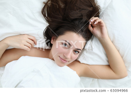 Nude lady in bed 63094966