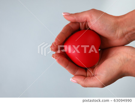 Woman with love symbol Woman with love symbol 63094990