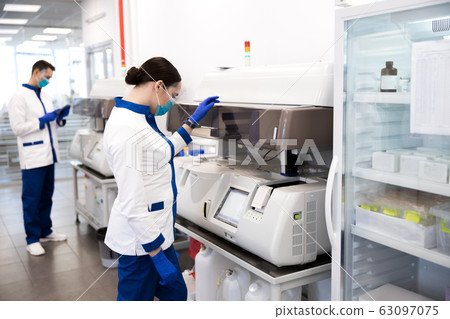 Female scientist doing molecular allergy diagnostics in lab Female scientist doing molecular allergy diagnostics in lab 63097075