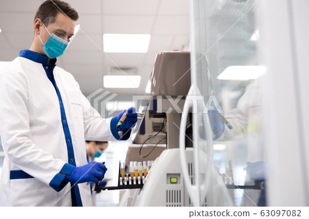 Researcher doing molecular allergy diagnostics in laboratory Researcher doing molecular allergy diagnostics in laboratory 63097082