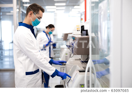 Scientist doing molecular allergy diagnostics in laboratory Scientist doing molecular allergy diagnostics in laboratory 63097085
