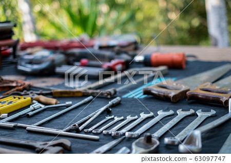 Photo top view a huge set collection of working hand and power tools many for the wooden on isolated black background 63097747
