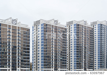 New modern tall blue glass multi-storey New modern tall blue glass multi-storey 63097967