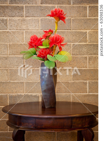 brown vase and flower brown vase and flower 63098336