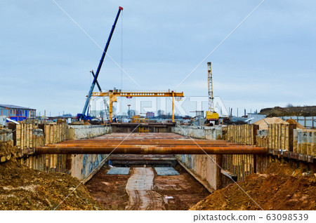 A large huge ditch pit tunnel with reinforcing A large huge ditch pit tunnel with reinforcing 63098539