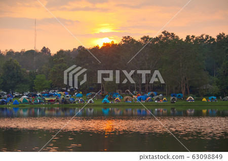 Camping tents by the lake Camping tents by the lake 63098849
