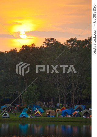 Camping tents by the lake Camping tents by the lake 63098850