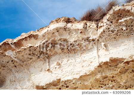 Cliffs by the sea. 63099206