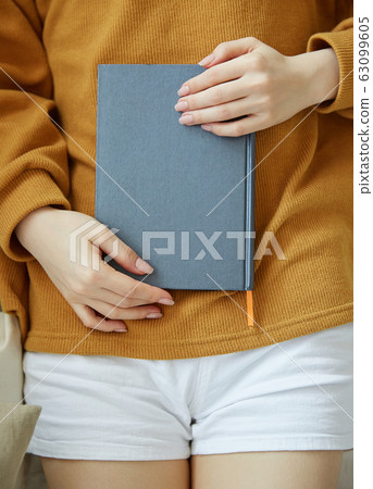 Young woman enjoying leisure on holidays Young woman enjoying leisure on holidays 63099605