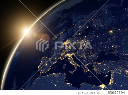 Planet Earth at night, view of city lights showing 63099894