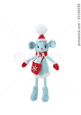 Mouse blue knitted with a red hat, mittens and a bag stands in boots on a white background, isolate Mouse blue knitted with a red hat, mittens and a bag stands in boots on a white background, isolate 63100599