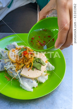 Vietnamese street food- Banh Cuon served with sweet fish sauce Vietnamese street food- Banh Cuon served with sweet fish sauce 63101962