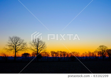 Colorful countryside sunset 63102209