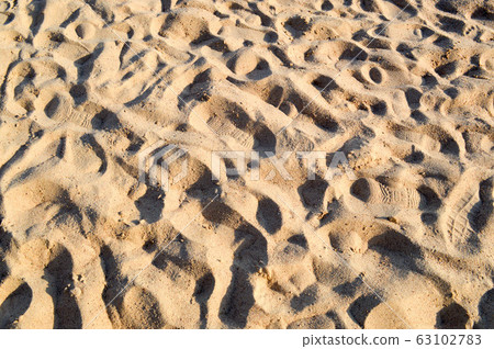 Beautiful yellow airy loose sea sand Beautiful yellow airy loose sea sand 63102783