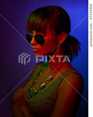 portrait of a cool and stylish strong girl with glasses but very sad portrait of a cool and stylish strong girl with glasses but very sad 63104468