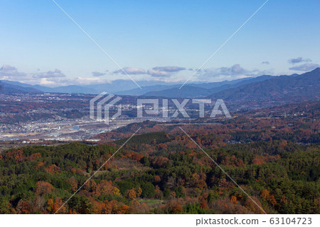 Autumn scenery of Shimoina, such as Iida and Matsukawa, seen from the Kaminomine Castle ruins, taken in November 2019 63104723
