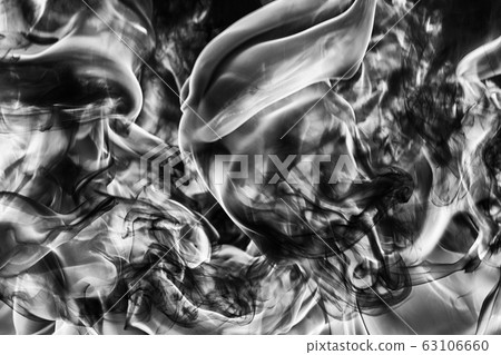 Abstract plume of natural black smoke, white huge flame of strong fire, motion blur from fire, high temperature flames. Dramatic black and white image Abstract plume of natural black smoke, white huge flame of strong fire, motion blur from fire, high temperature flames. Dramatic black and white image 63106660