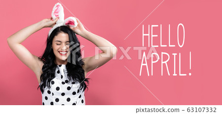 Hello April message with woman with Easter theme 63107332